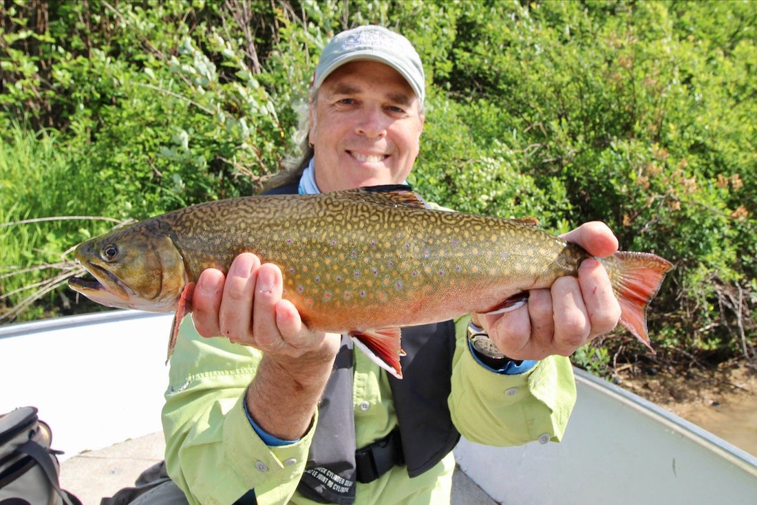 Scott Hall holding a brook trout