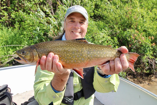 Scott Hall holding a brook trout
